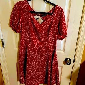 A beautiful red dress with a white leaf pattern, brand new with tags